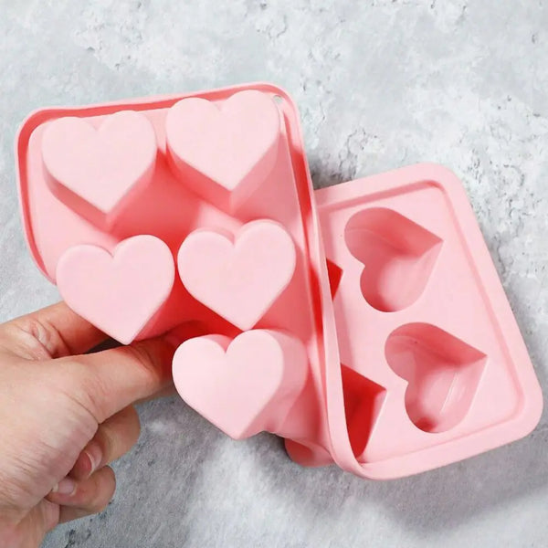 Pink heart-shaped ice grid mold